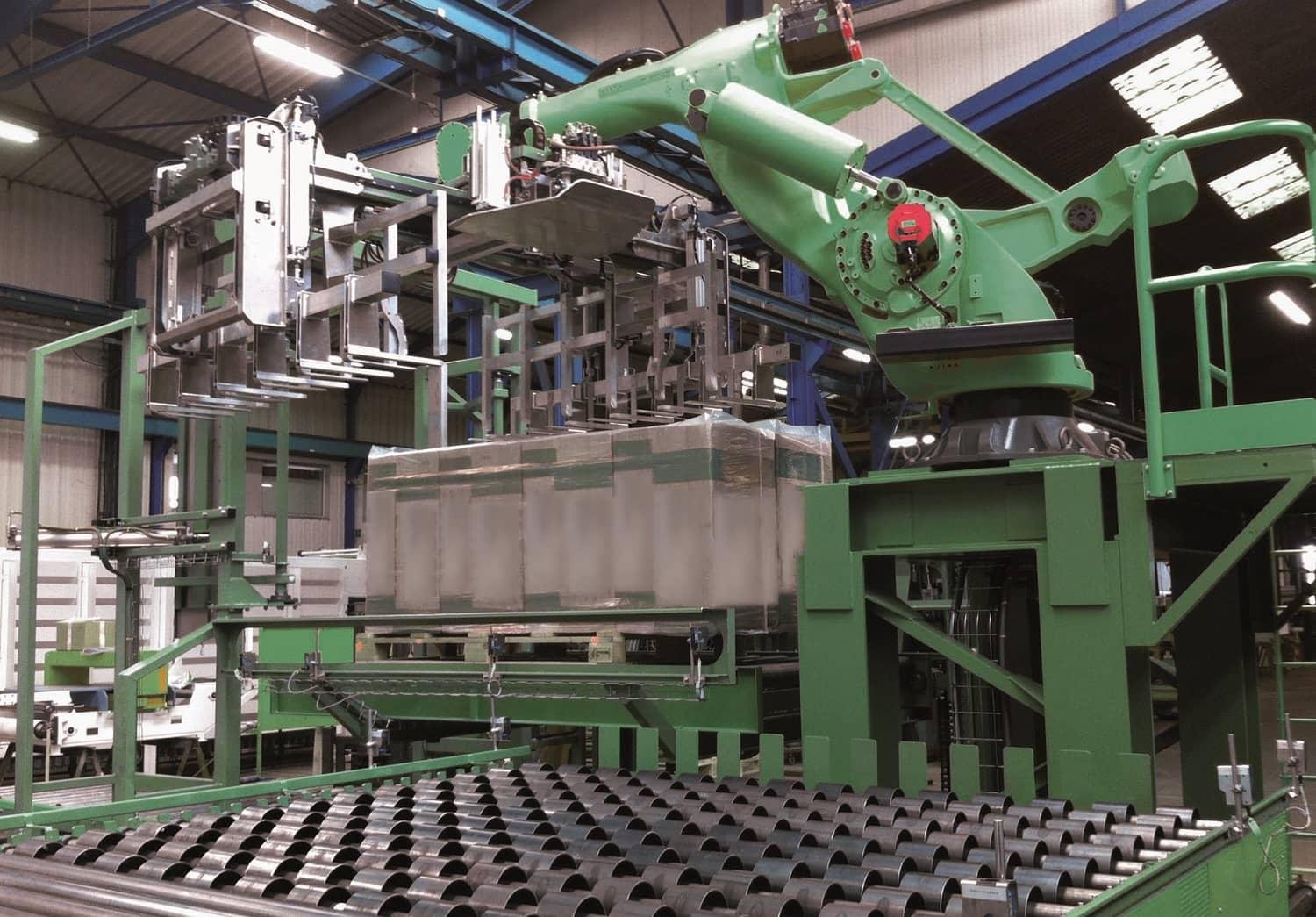 Industrial robots with grippers on a handling line