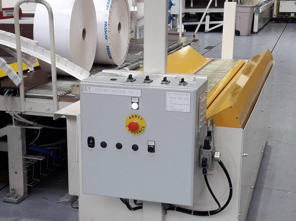 Control cabinet for a paper reel handling installation