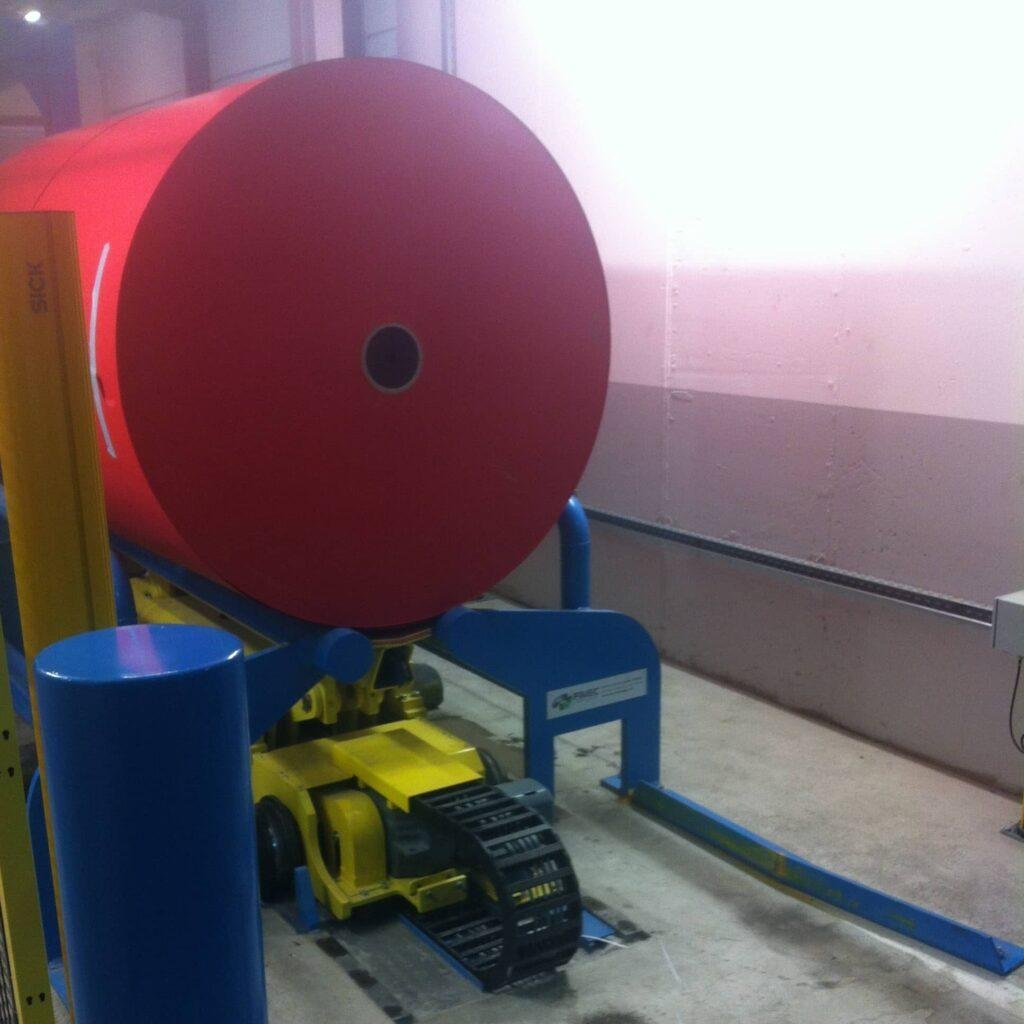 Paper reel entering a handling line
